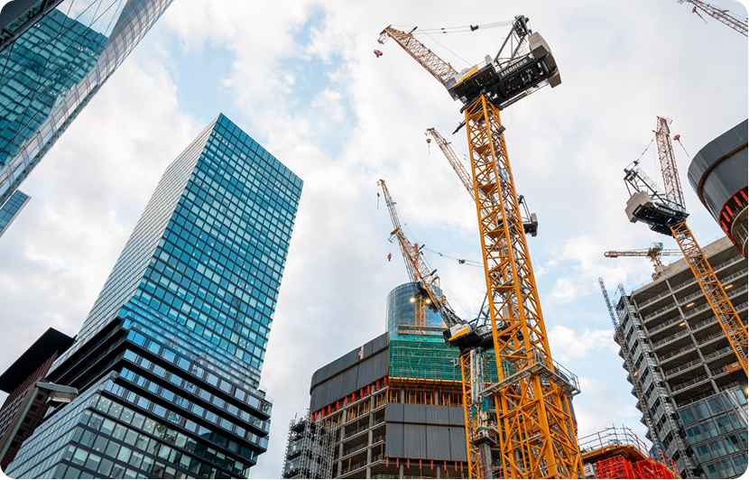 Construction cranes in city
